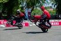 Yamaha scooter stunt drivers. Royalty Free Stock Photo