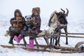 The Yamal Peninsula the extreme north. Happy boy and girl on reindeer herder pasture in a cold winter day polar circle children