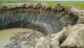 YAMAL PENINSULA, RUSSIA - JUNE 18, 2015: Expedition to the giant funnel of unknown origin. Crater view. Royalty Free Stock Photo