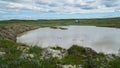 YAMAL PENINSULA, RUSSIA - JUNE 18, 2015: Expedition to the giant funnel of unknown origin. Former crater, which became a Royalty Free Stock Photo