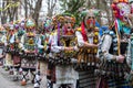 People in traditional carnival kuker costumes at Kukeri festival kukerlandia Yambol, Bulgaria