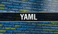 YAML text written on Programming code abstract technology background of software developer and Computer script. YAML concept of