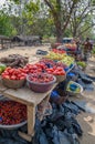 Yamoussoukro, Ivory Coast - January 31,2014: Tomatoes and other vegetables for sale at road side market