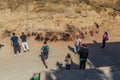 YANAR DAG, AZERBAIJAN - JUNE 19, 2018: Tourists observe Yanar Dag, burning mountain, continuous natural gas fire in Royalty Free Stock Photo