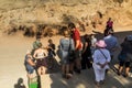 YANAR DAG, AZERBAIJAN - JUNE 19, 2018: Tourists observe Yanar Dag, burning mountain, continuous natural gas fire in Royalty Free Stock Photo