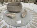 Yanardag, Azerbaijan, September, 10, 2019. Ancient small water vessel and stone gutters on the territory of Yanardag museum