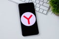 Yandex Browser app logo on a smartphone screen. Royalty Free Stock Photo