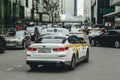 Yandex Taxi car near Moscow International Business Center street, Moscow-City skyscrapers.