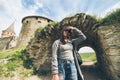 Yang pretty woman tourist in front of castle