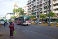 Route buses on city street, Yangon