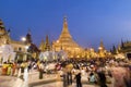 YANGON, MYANMAR, December 25, 2017: Shwedagon Pagoda with believers Royalty Free Stock Photo