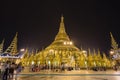 YANGON, MYANMAR, December 25, 2017: Shwedagon Pagoda with believers Royalty Free Stock Photo