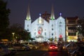 View of the Baptist church of St. Immanuel in the Christmas illumination in the evening. Yangon, Myanmar