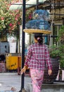 A woman selling birds on street