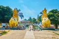 Behind the lion guardians of Mahavijaya Pagoda, Yangon, Myanmar