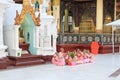 Group of burmese nuns sitting and praying in front of Shwedagon pagoda 1 of 5 sacred places