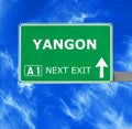 YANGON road sign against clear blue sky