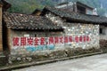 Yangshuo, China - March 17, 2012: Slogan on a wall urges to use condoms and prevent spreading of AIDS and sexually transmitted