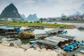 YANGSHUO, CHINA - MAY 26, 2018: Scenic landscape at Yangshuo County of Guilin. Li River (Lijiang River). Pleasure boats at the pi Royalty Free Stock Photo