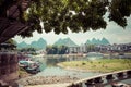 YANGSHUO, CHINA - MAY 26, 2018: Scenic landscape at Yangshuo County of Guilin. Li River (Lijiang River). Pleasure boats at the pi Royalty Free Stock Photo