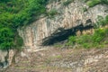 Narrow cave opening in Xiling gorge, Xiangxicun region on Yangtze River, China