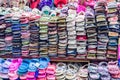 YANJIXI, JILIN, CHINA - March 9, 2018: Slippers are sold spread out and stacked