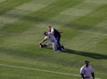 Yankee Alex Rodriguez gets help stretching