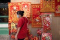 Yaowarat street market during Chinese New Year festival celebrates holidays shop sale red envelopes paper with lucky word and