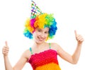 Yappy girl in clown wig shows thumbs up isolated Royalty Free Stock Photo