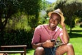 Yappy young man listening music on mobile phone Royalty Free Stock Photo