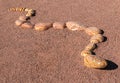 Snake of painted rocks, yard art Royalty Free Stock Photo