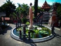 Yard Of Buddhist Temple With Buddha Statue Give Blessings In The Middle Of The Pond In Bali Royalty Free Stock Photo