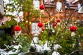 Yard of a country house with New Year`s decoration covered with snow. Royalty Free Stock Photo