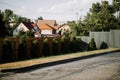 yard with lawn sprinkler spaying water over green grass. Royalty Free Stock Photo