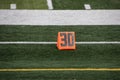 30 yard line marker at American football game Royalty Free Stock Photo