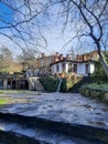 The yard of a luxurious mansion on a mountain in the fall in the daytime Royalty Free Stock Photo