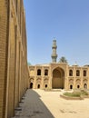 A yard and many rooms in the middle of an ancient mosque in the city of Baghdad