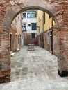 yard with old well in Venice in winter evening Royalty Free Stock Photo