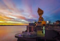 Yard serpent spits water on the Mekong River in Nakhon Phanom with sunrise.