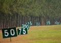Yard signs in driving range Royalty Free Stock Photo