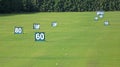 Yard signs in driving range Royalty Free Stock Photo