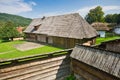 Yard between wooden houses in open air musem near Bardejovske kupele spa resort during summer