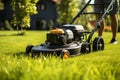 Yardwork in action Mowing the grass for a neat lawn