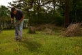 Yardwork bundling twigs Royalty Free Stock Photo