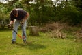 Yardwork bundling twigs Royalty Free Stock Photo