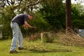 Yardwork bundling twigs Royalty Free Stock Photo