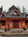 Wooden architecture in Yaremche, Carpathians. Building of estaurant kolyba in family resort Royalty Free Stock Photo