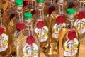 Yaremche Ukraine. 25 june 2021: Bottles with handmade vodka on the shelves. Alcoholic drinks from different berries and fruits
