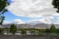 Yarlung Tsangpo River reflects the a Tibetan mountain range in the Brahmaputra Valley of the Tibet Autonomous Region of China.