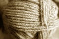 Yarn ball close-up with blur effect in brown tone Royalty Free Stock Photo